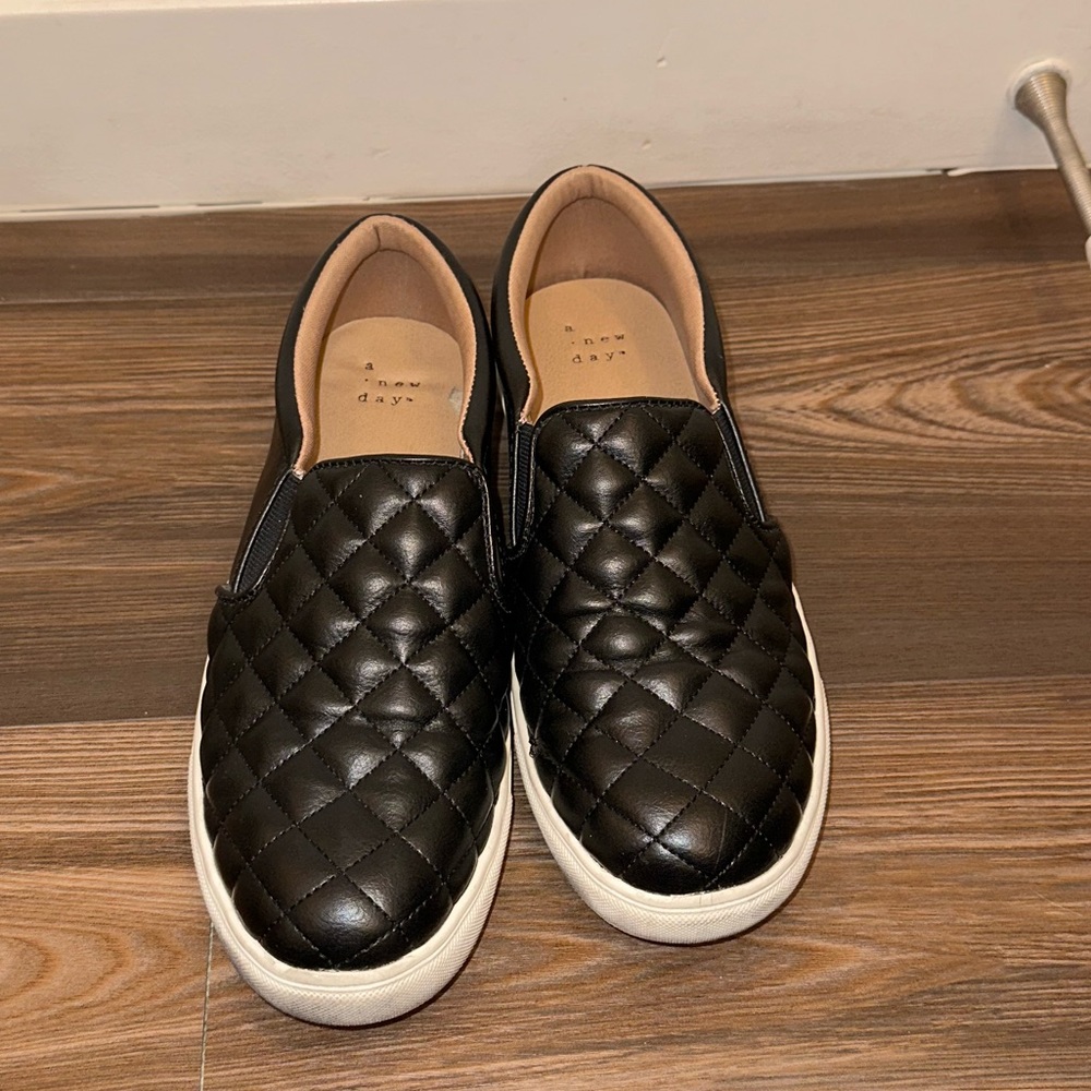 Black leather slides